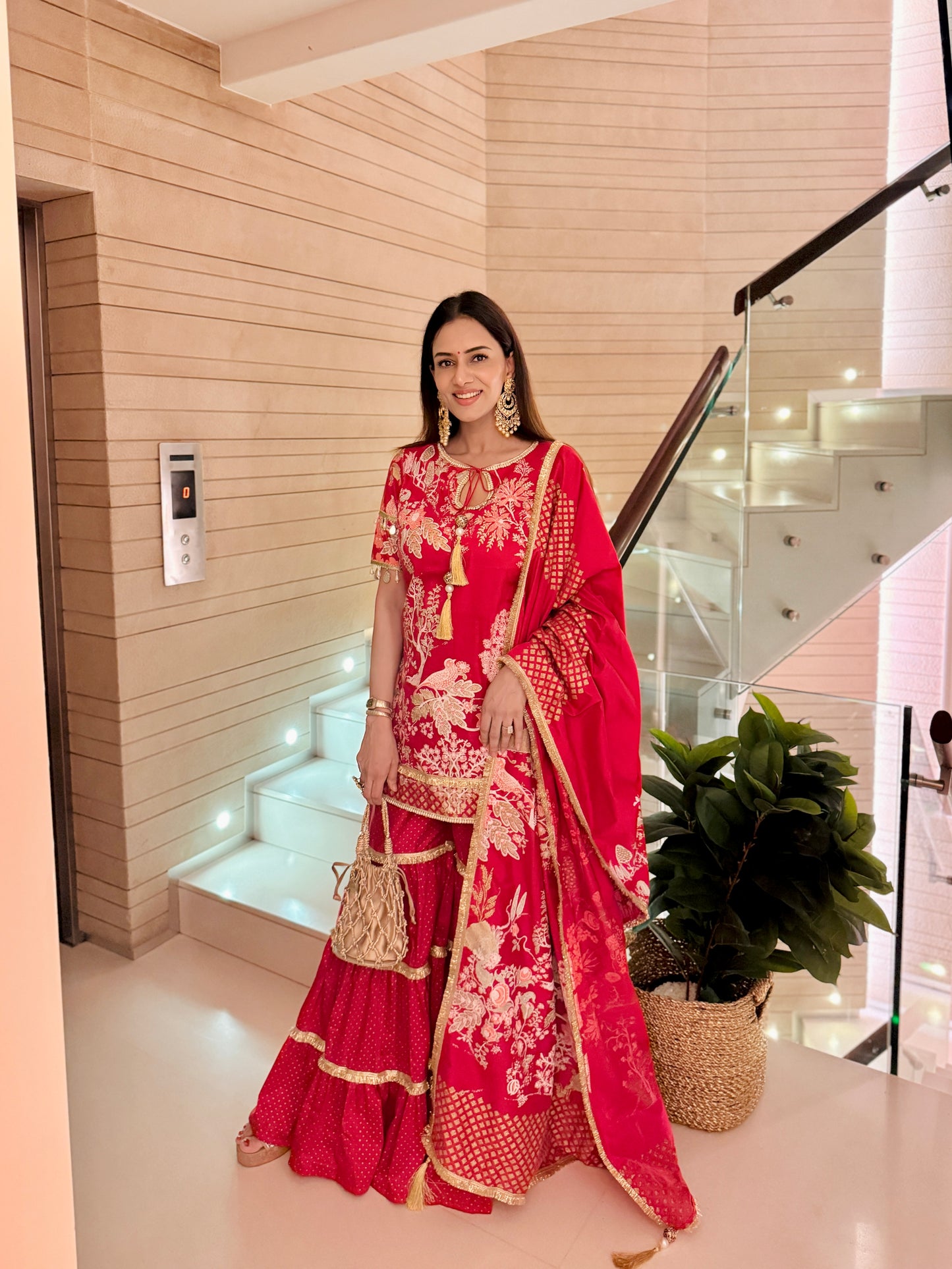 Smriti Khanna In Red Noor Keyhole Kurta, with Garara and Flowing Dupatta